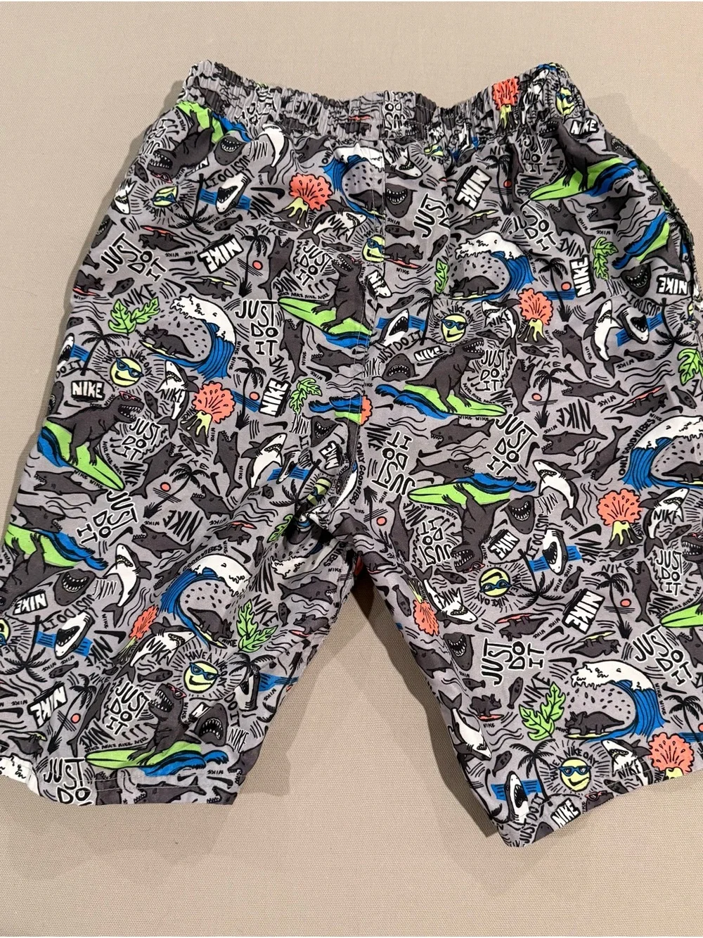 Nike Kids Gray Swim Trunks with Bright Graphic Print